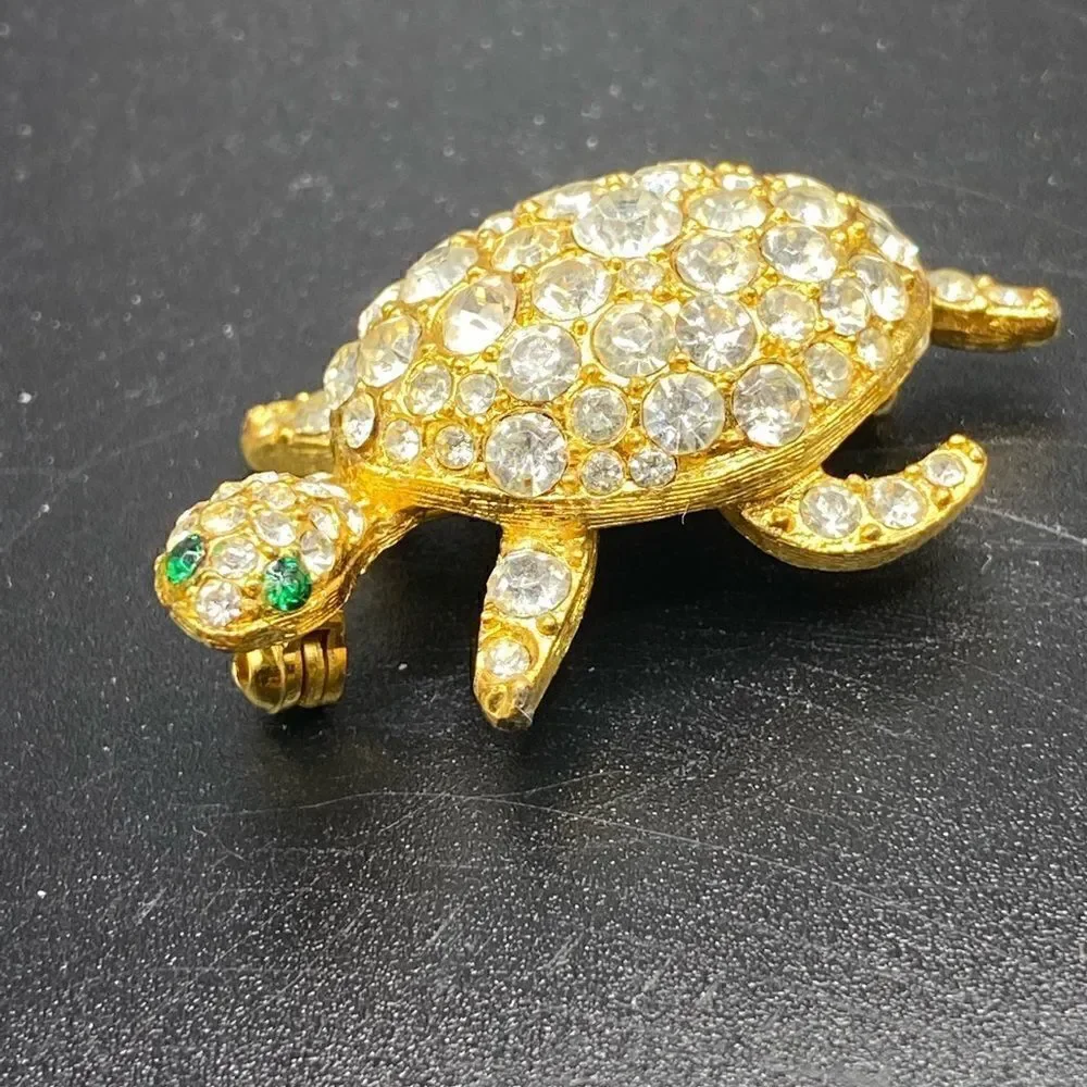 Gold tone rhinestone turtle tortoise pin brooch with green glass eyes gorgeous